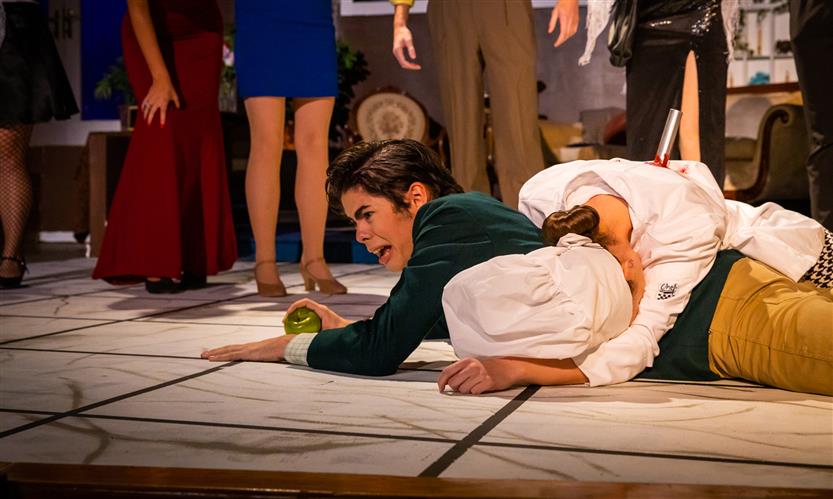 Students perform Clue onstage